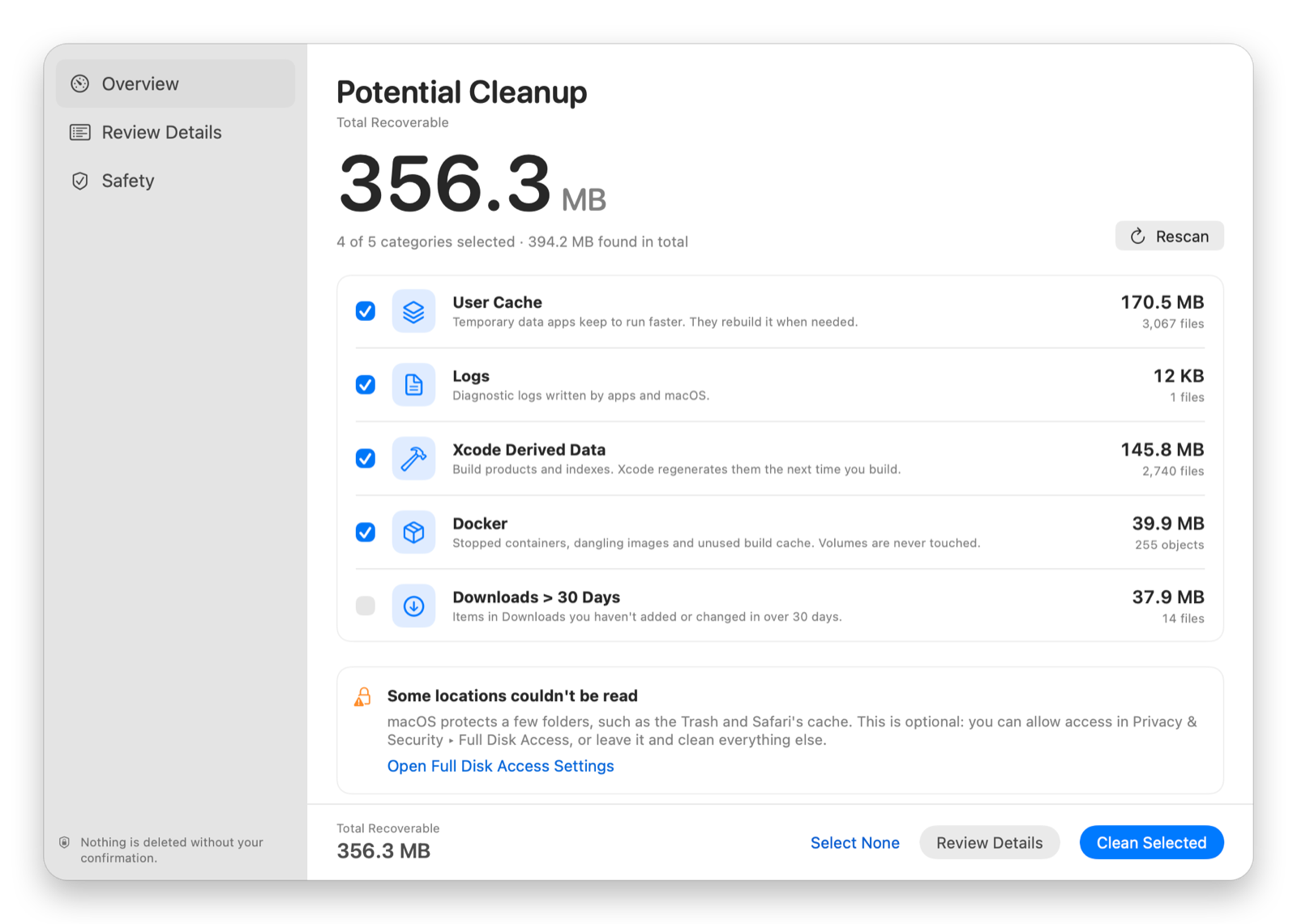 Mac Cleanup Assistant results screen listing User Cache, Logs, Xcode Derived Data, Docker and Downloads with sizes and checkboxes